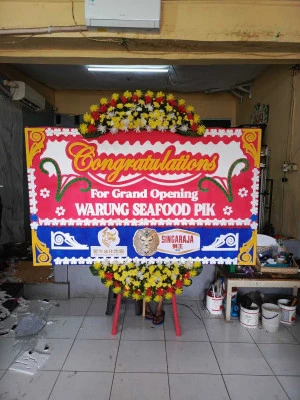 Papan Bunga di Megal Pamotan